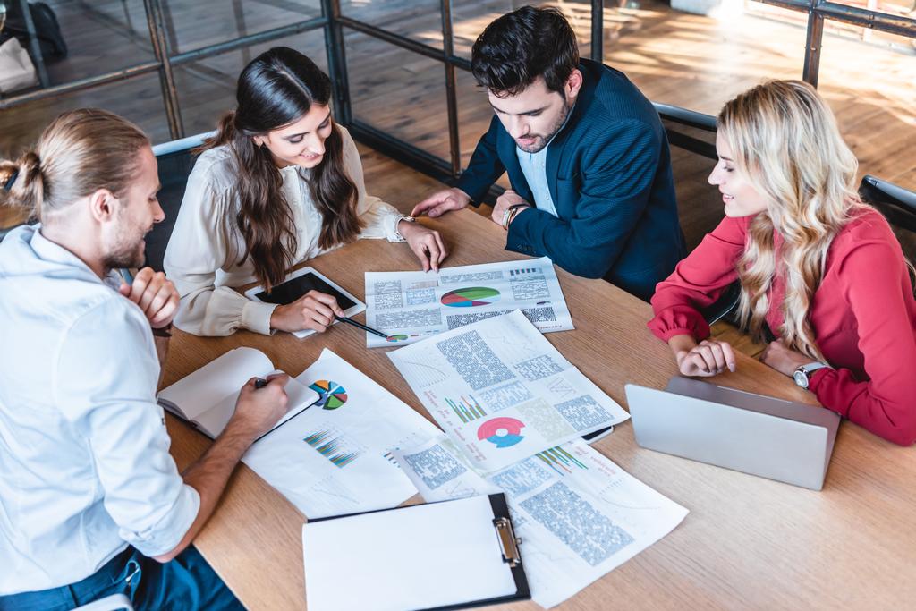 stock-photo-business-team-discussing-new-business